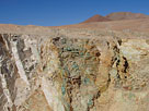 Copper mineralization in wall of hand dug open pit in the Atacama Region, Chile